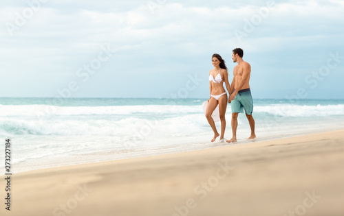 loving couple enjoying on beach