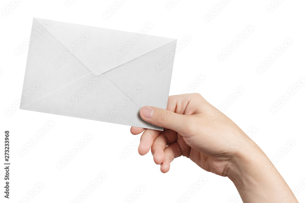 Hand holding a white envelope, isolated on white background