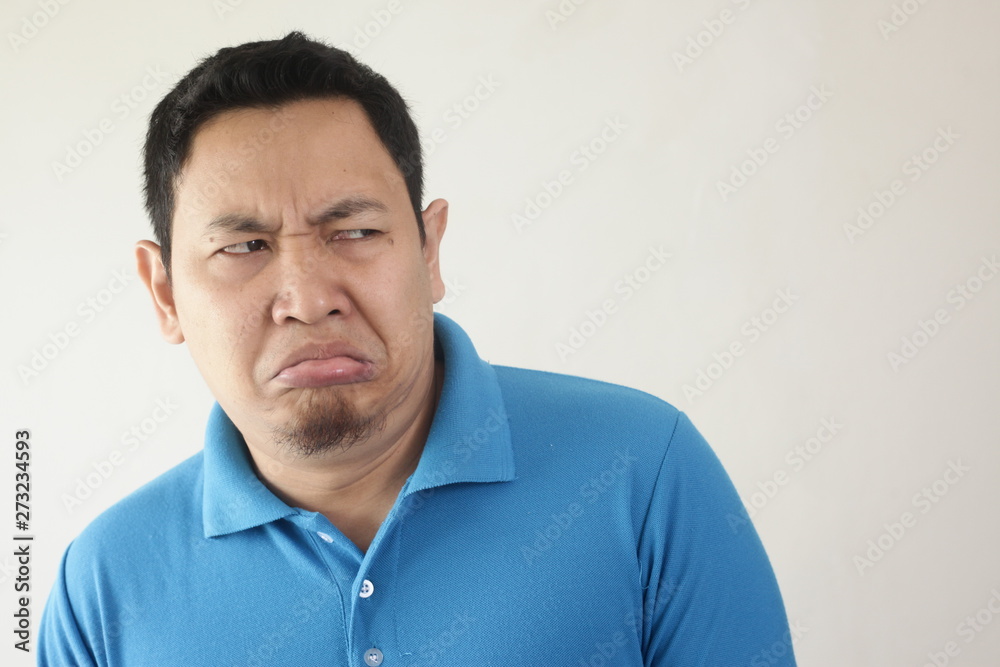 Man Shows Disgusted or Displeased Expression Man Shows Disgusted or Displeased Expression