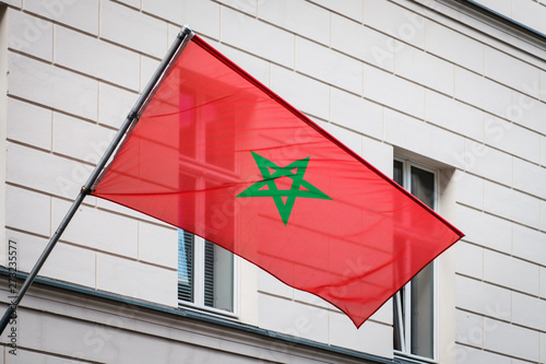 moroccan flag on pole on building - morocco flag -