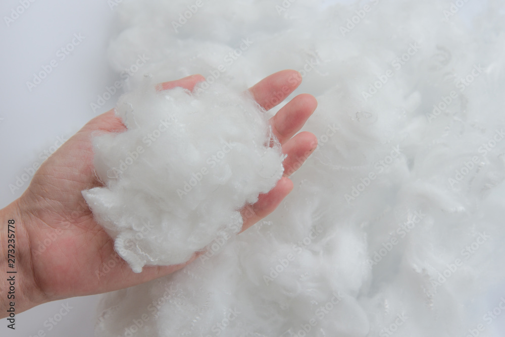 Woman hand holding Polyester stable fiber Woman hand holding Polyester stable fiber