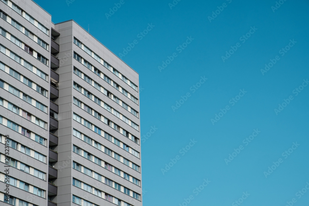residential building , apartment building facade with blue sky copy space