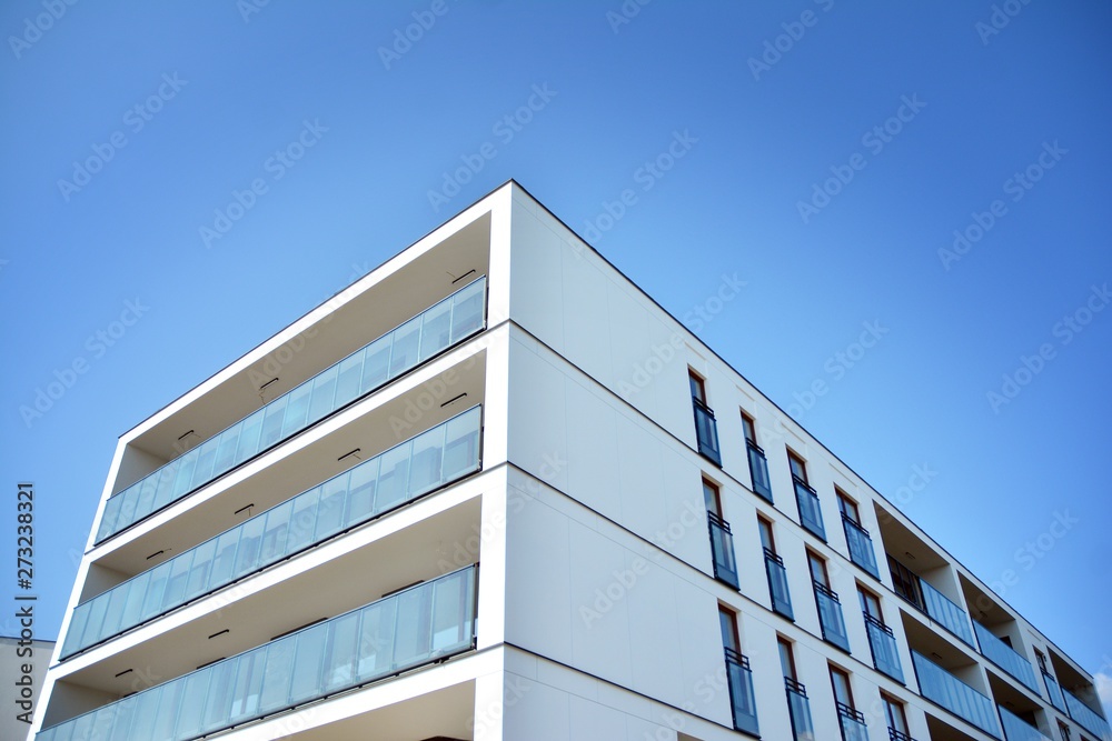 Multistory new modern apartment building. Stylish living block of flats. Multistory new modern apartment building. Stylish living block of flats.