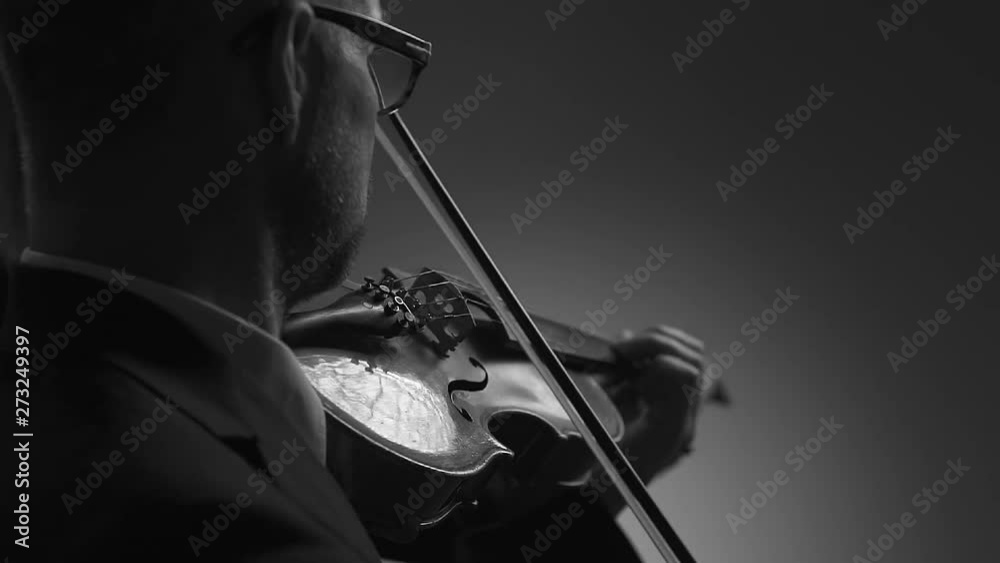 Violinist performing at classical music concert