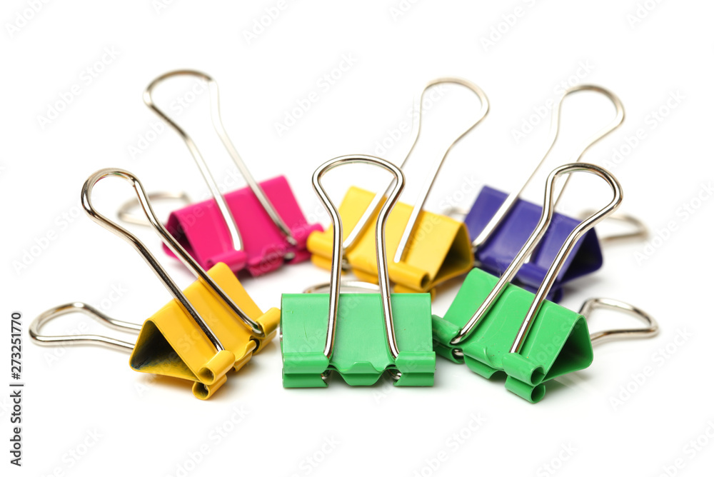 Four binder clips isolated on white background Four binder clips isolated on white background