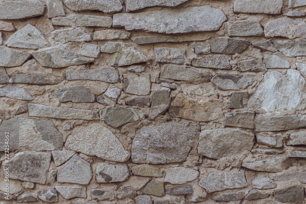 wild decorate stone wall texture. natural facade home dry background. old grunge rocks retro vintage wallpaper wild decorate stone wall texture. natural facade home dry background. old grunge rocks retro vintage wallpaper