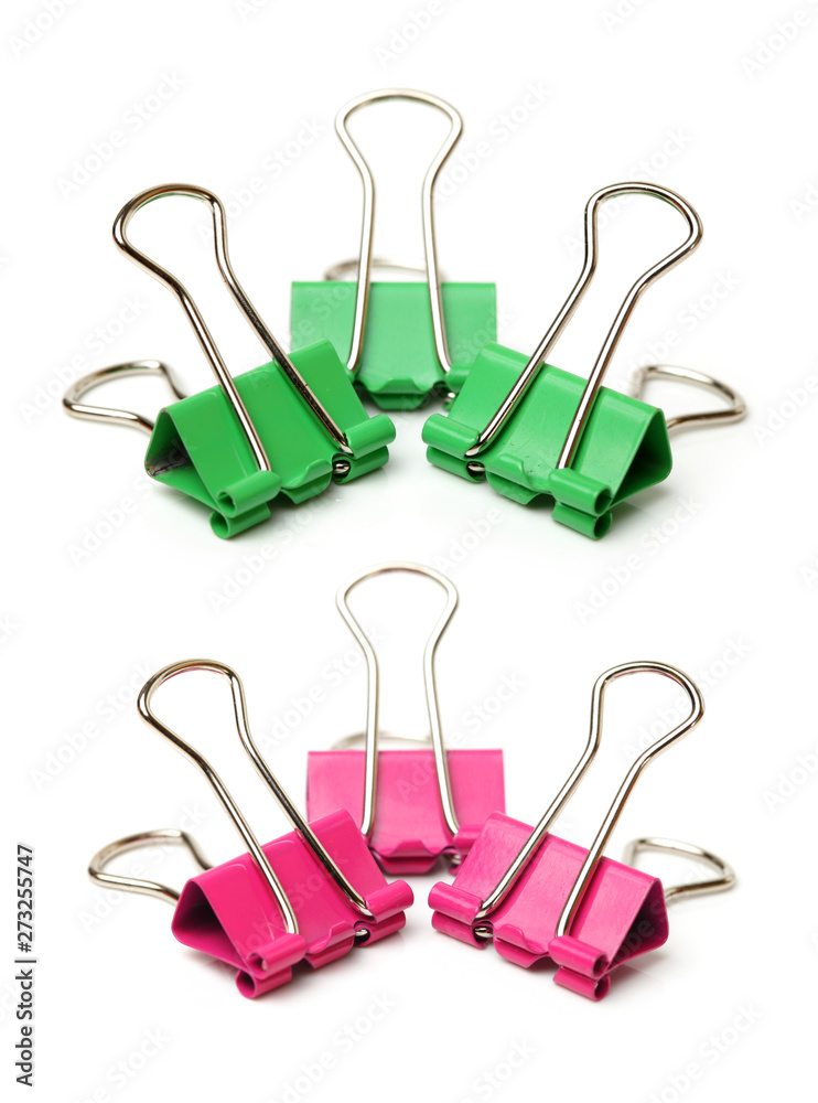 Four binder clips isolated on white background Four binder clips isolated on white background