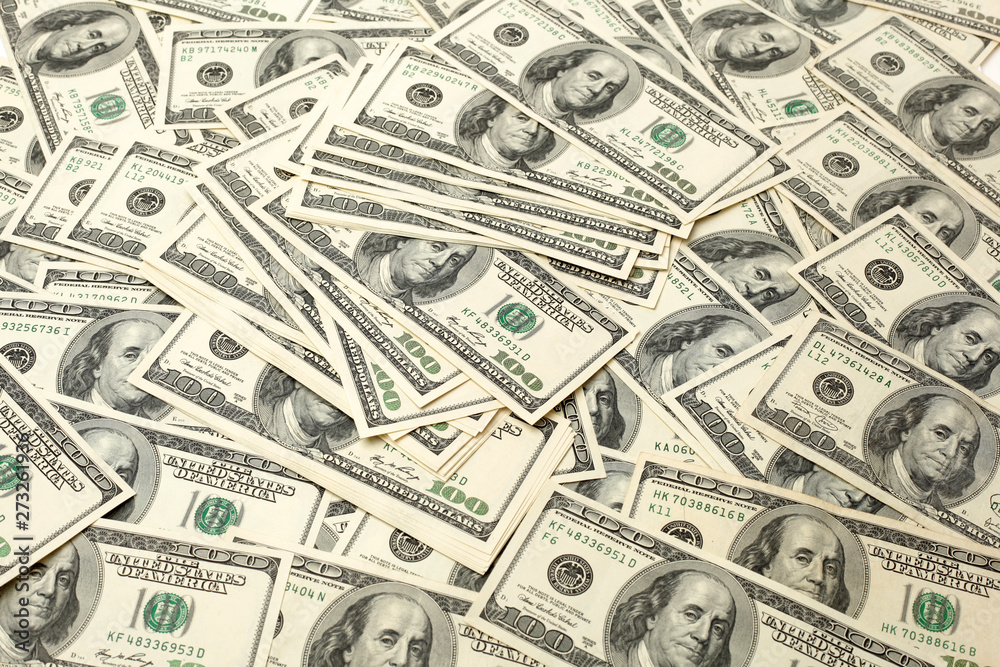 Canvas money sack with one hundred dollar bills Canvas money sack with one hundred dollar bills
