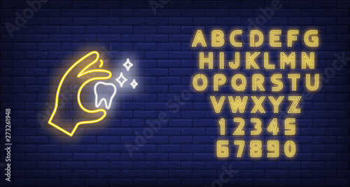 Tooth in hand neon sign. Luminous signboard with molar tooth. Night bright advertisement. Vector illustration in neon style for dentistry, clinic, healthcare