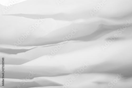 Closeup of white paper layers stack abstract art background. Defocused fog effect. Copy space.