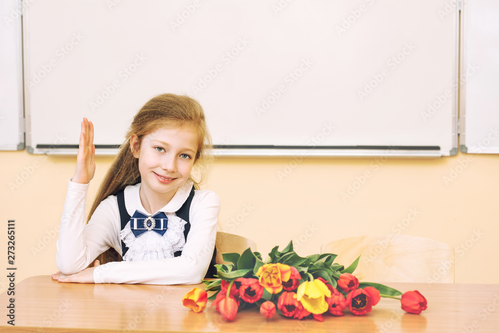 Beautiful girl baby the girl happy with a smile in the classroom with the flowers Beautiful girl baby the girl happy with a smile in the classroom with the flowers