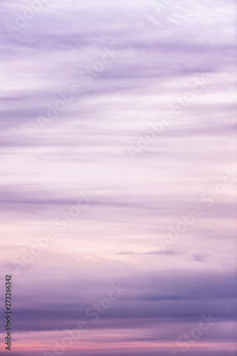 Beautiful lilac sunset on the sky  background. Space for text. Vertical.