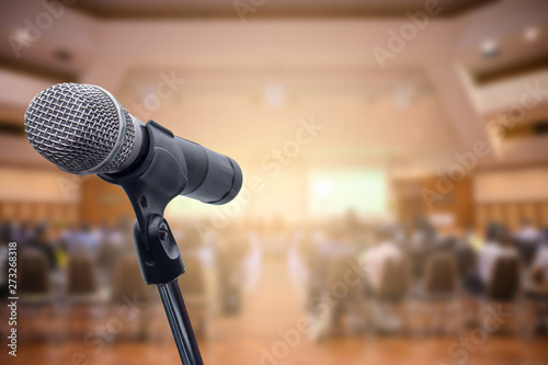 Microphone over the blurred business people forum Meeting Conference Training Learning Coaching Concept, Blurred background.