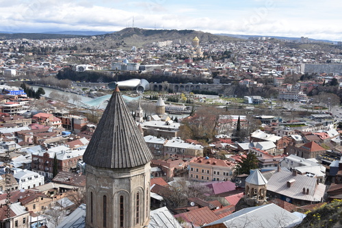 Tbilisi, Georgia Cityscape with Upper Betlemi Church in Foreground photo