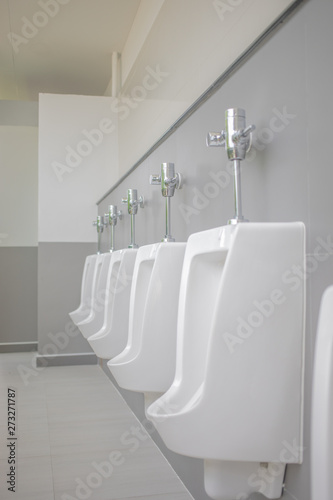 White urinals in the male bathroom