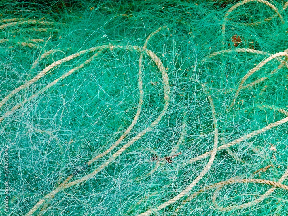 closeup of colorful fisher nets and fisher rope closeup of colorful fisher nets and fisher rope