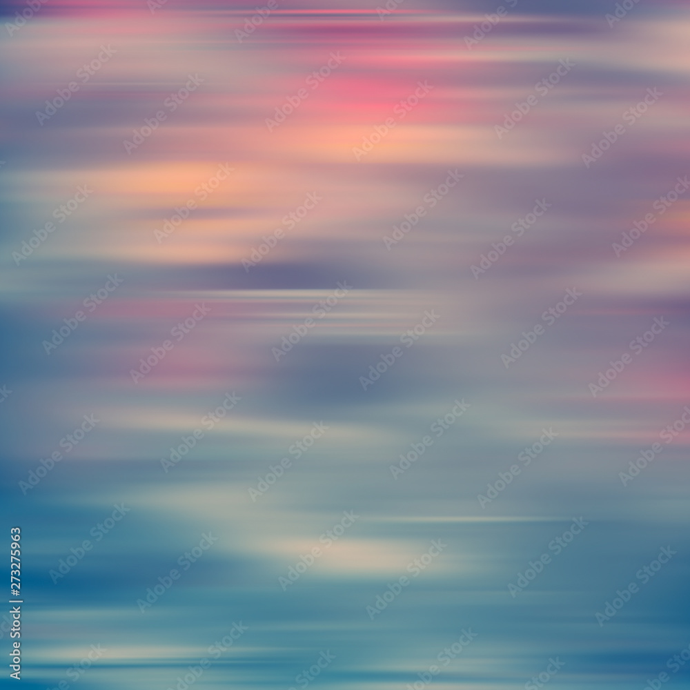 Blurred light background of pink, blue, yellow spots.