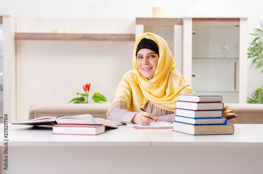 Female student in hijab preparing for exams Female student in hijab preparing for exams