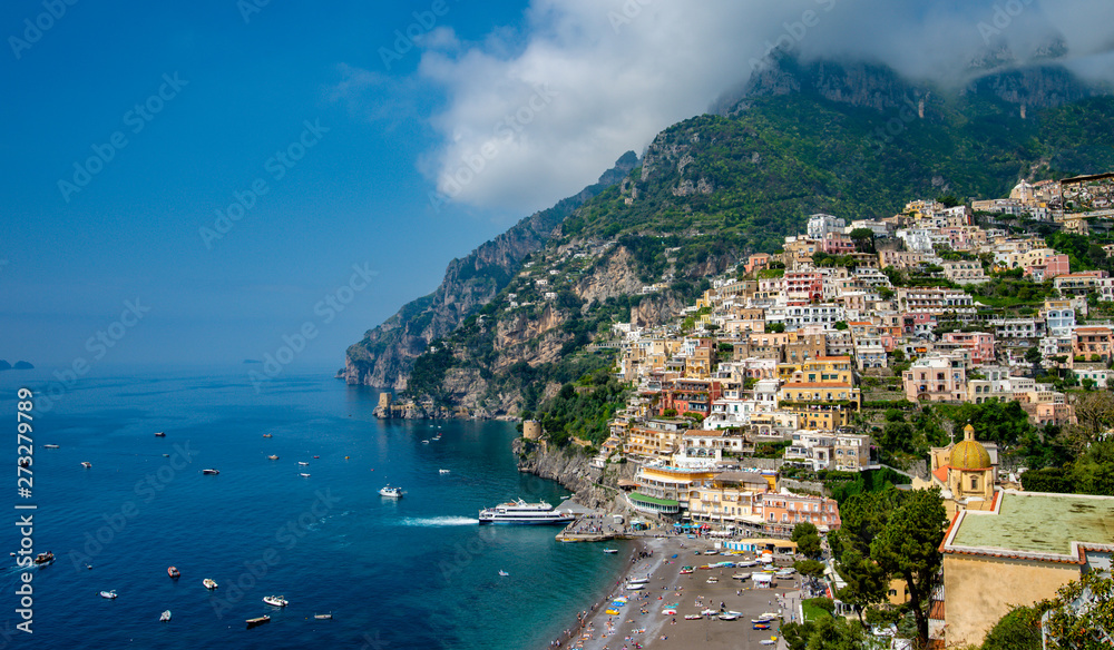 Landscape  of beach and colorful buildings  in Positano town  at  Amalfi Coast, Italy.