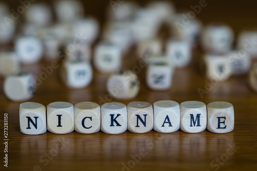 Nickname written with wooden cube photo