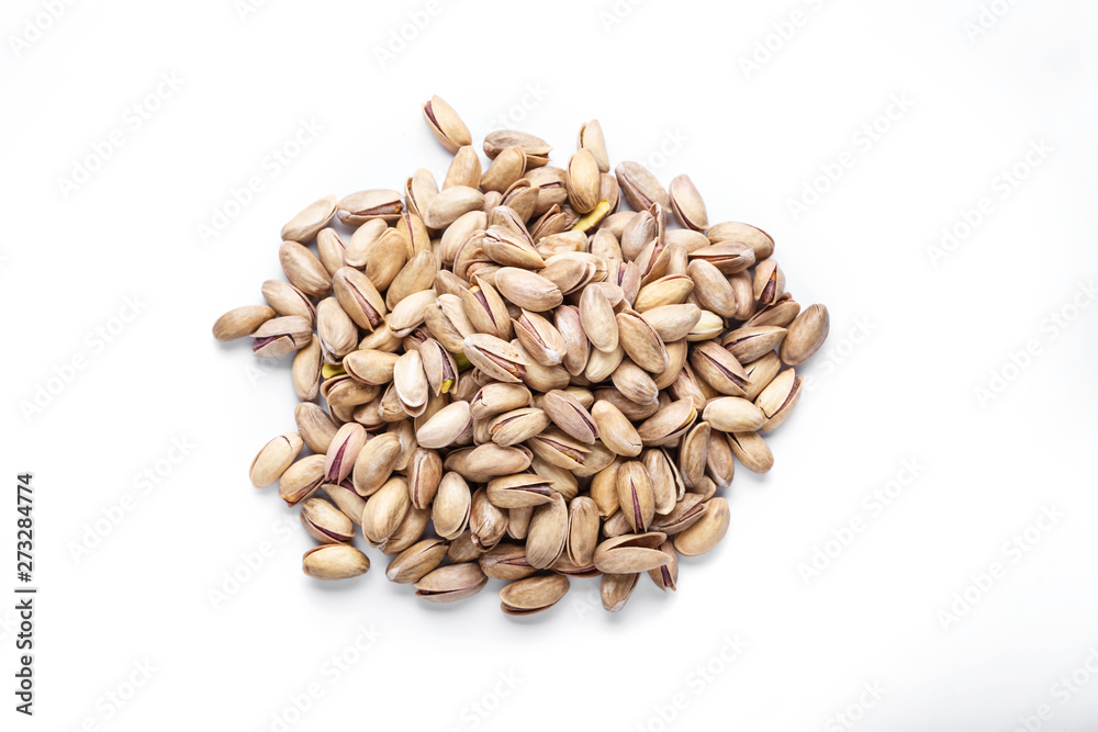 Obraz premium Pistachio nuts. Isolated on a white background