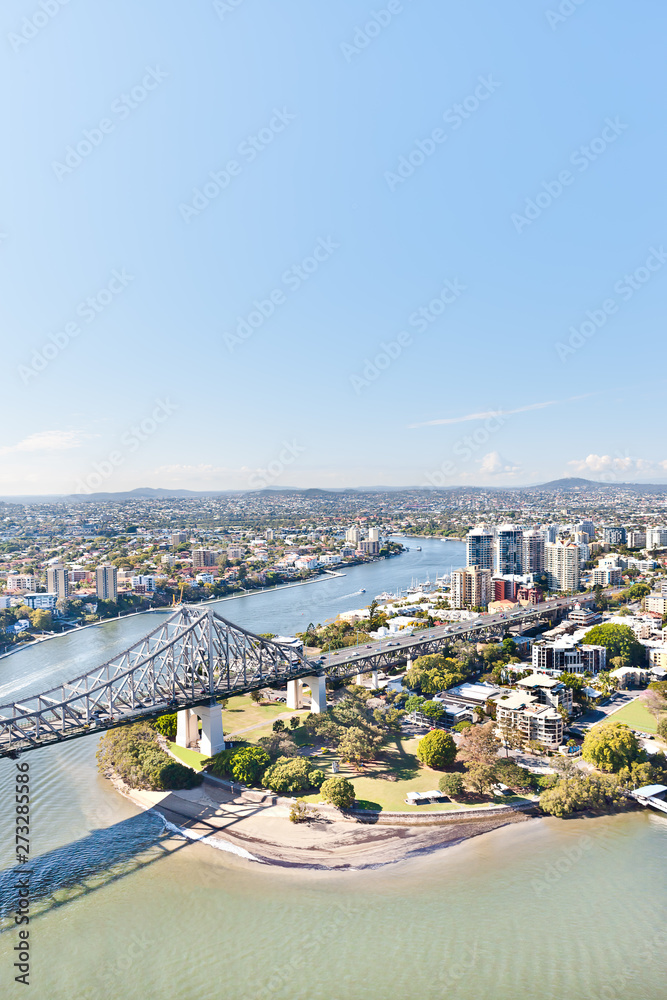 Obraz premium Modern city from the blue sky photo with a bridge