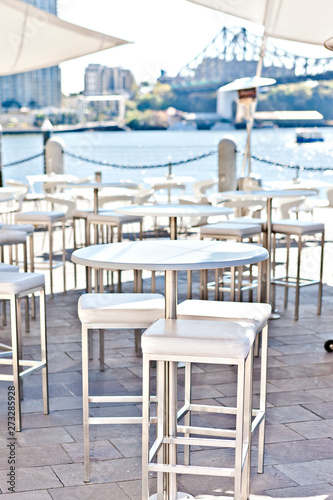Close view of the round white  chairs and tables © JRstock