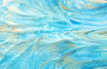 photography of abstract marbleized effect background. Blue, mint, gold and white creative colors. Beautiful paint