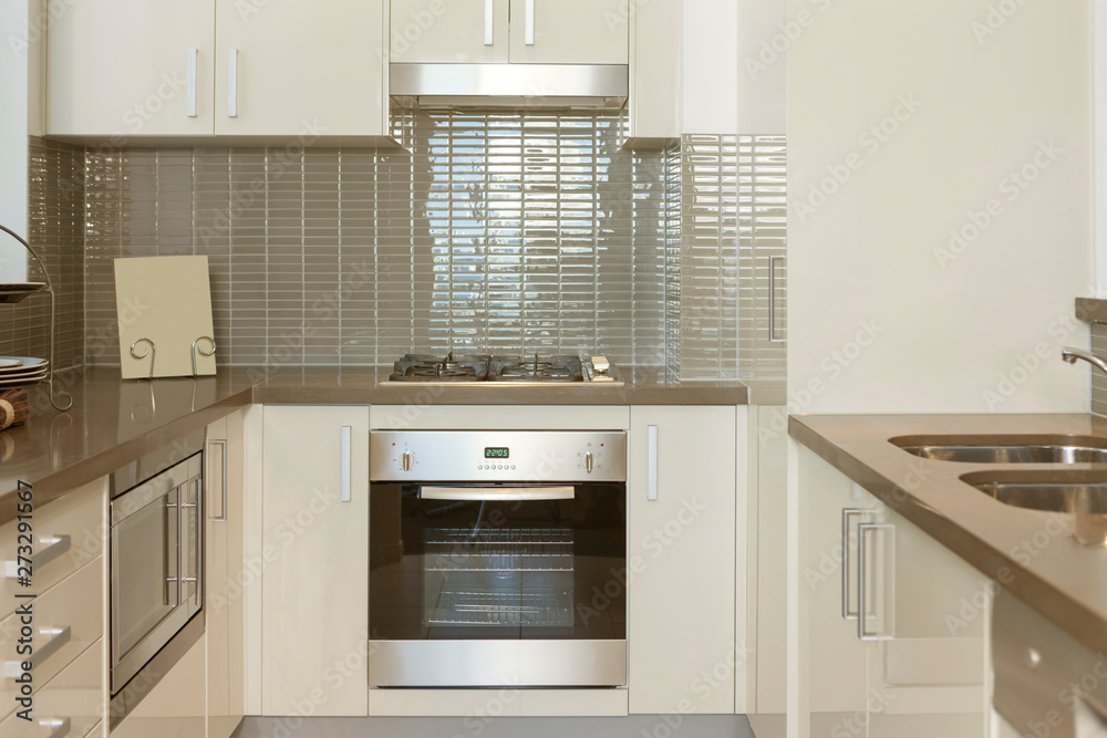 Fototapeta premium Small kitchen with built in stove