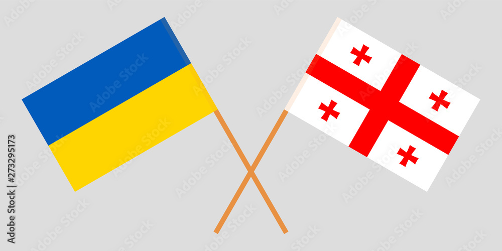 Georgia and Ukraine. Crossed Georgian and Ukrainian flags