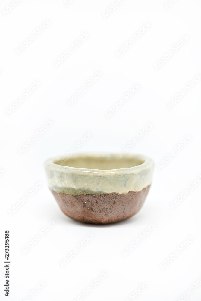 Teacup on white background.