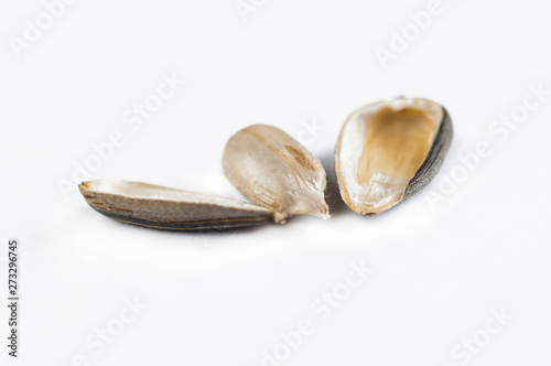 Peeled sunflower seeds isolated on white background.Copy space