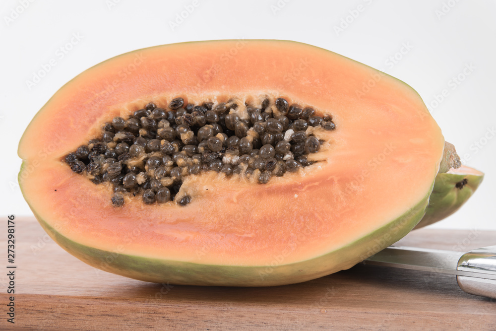 Background Close up Meat in half filled with seeds of Papaya Background Close up Meat in half filled with seeds of Papaya