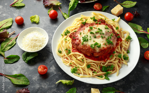 Chicken Parmesan with Cheese and Marinara Sauce served over spaghetti  pasta