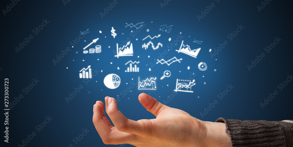 Hand holding application icons and symbols in her hand
Hand holding application icons and symbols in her hand