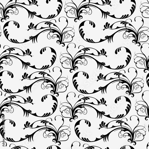 Seamless vector pattern with black curls on a white background