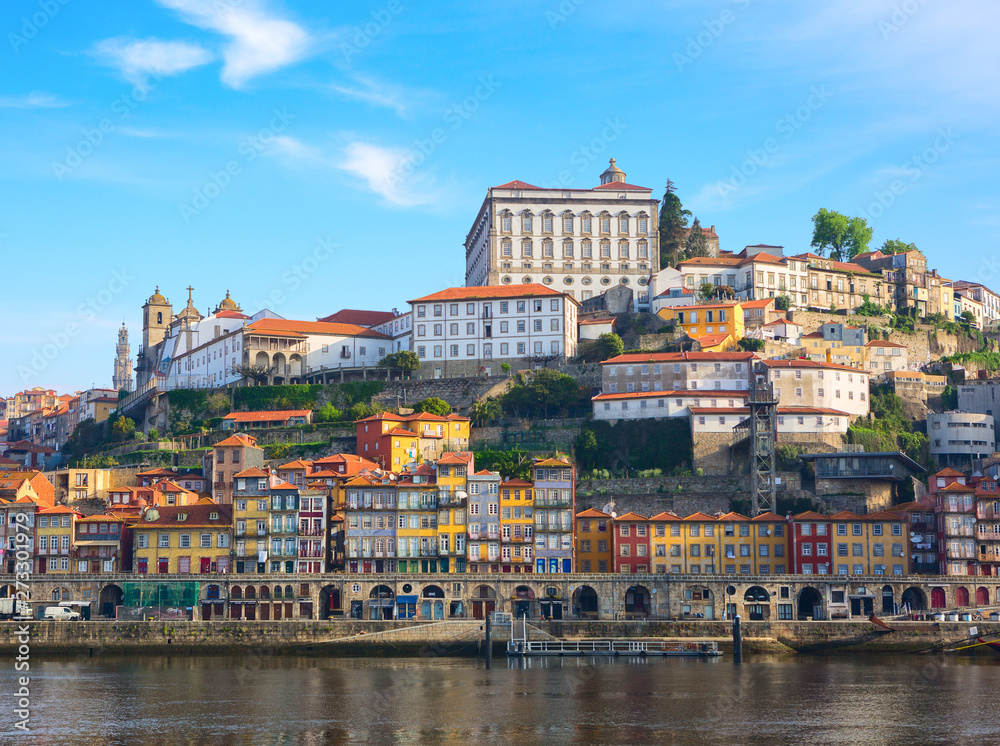 Scenic view on the historical part of Porto and the Douro river in  sunny spring morning, Portugal.