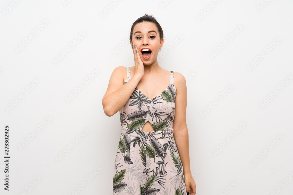Young woman over isolated white background with surprise and shocked facial expression Young woman over isolated white background with surprise and shocked facial expression