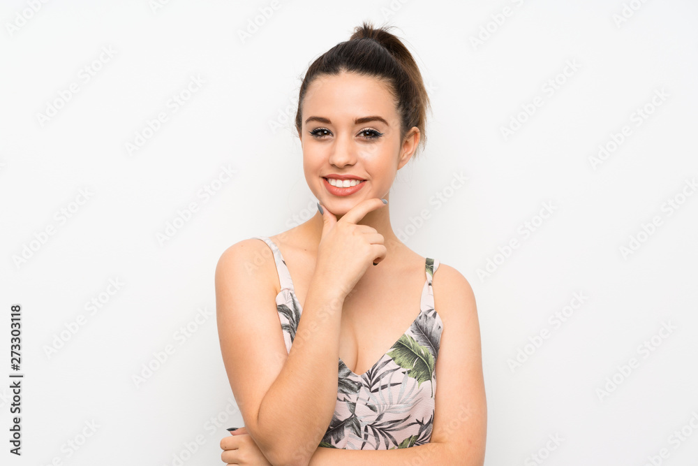 Young woman over isolated white background laughing Young woman over isolated white background laughing