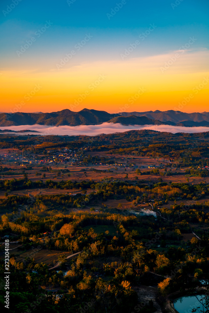 Scenic Colorful Landscape Sunrise in the Morning on The Hill at Phu Tok, Chiang Khan, Loei, Thailand.