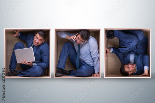 Photos Employee working in tight space