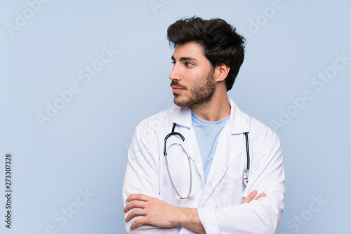 Doctor man standing and looking side