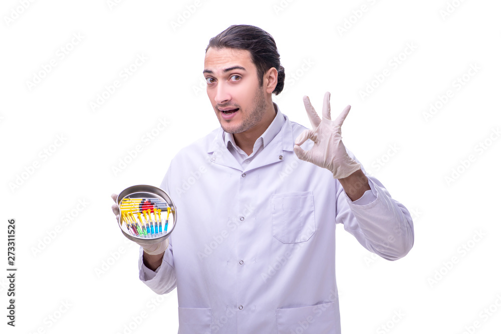 Young handsome doctor with syringe isolated on white Young handsome doctor with syringe isolated on white