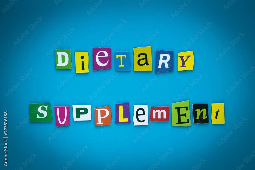 Text - Dietary Supplement on blue background from colorful letters. Card with an inscription. Headline, caption, heading on banner. Letter on bright illustration. Concept of diet nutrition, food. Text - Dietary Supplement on blue background from colorful letters. Card with an inscription. Headline, caption, heading on banner. Letter on bright illustration. Concept of diet nutrition, food.