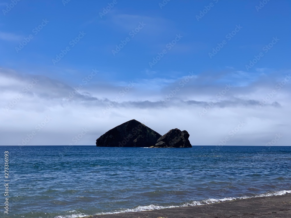 island in the sea on São Miguel island, Azores, Portugal near Ponta De Mosteiros