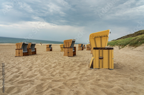 Sylt - View to abandoned Beach Chairs  at Beach at Wenningstedt / Germany © Manninx