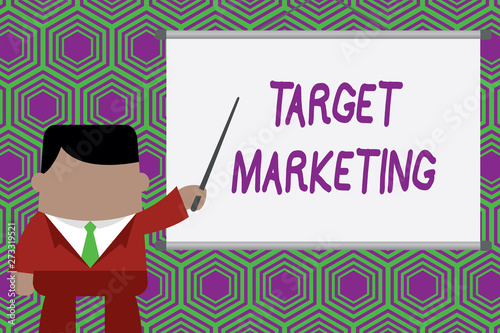 Conceptual hand writing showing Target Marketing. Concept meaning Audience goal Chosen clients customers Advertising Businessman standing in front projector pointing project idea © Artur
