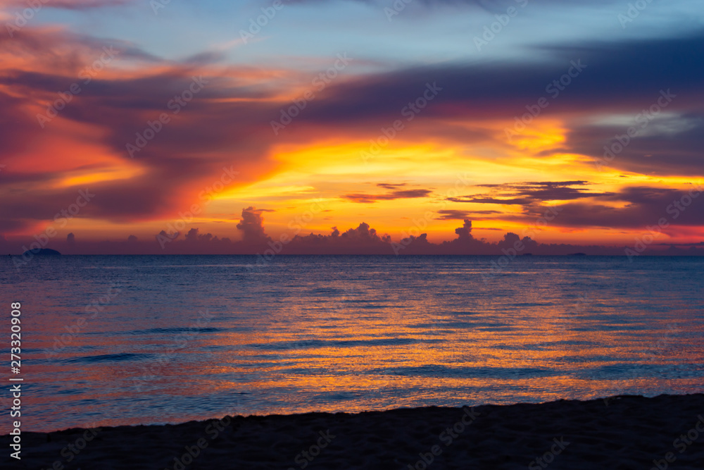 Tropical sea and beach on sunset and twilight sky.