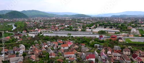 Panoramic picture of the city, houses, mountains, river.