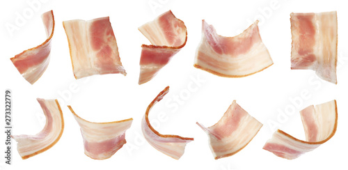 Set of cut delicious bacon on white background